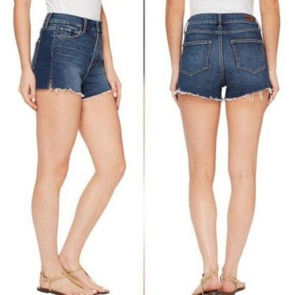 Paige mid rise medium/dark wash denim shorts raw hem